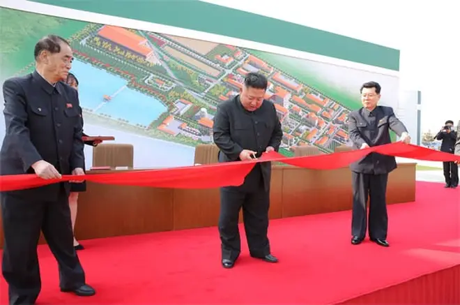 Kim Jong-Un reportedly cuts the ribbon at a fertiliser factory in Sunchon on Friday