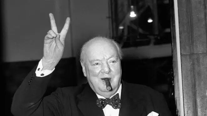 Winston Churchill giving his iconic V for Victory sign