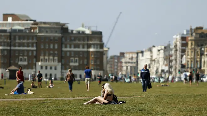 Despite warm weather this weekend, people must resist the urge to go out and sunbathe
