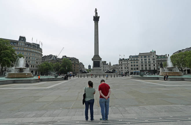People stopped by Trafalgar Square in London to observe the two-minute silence