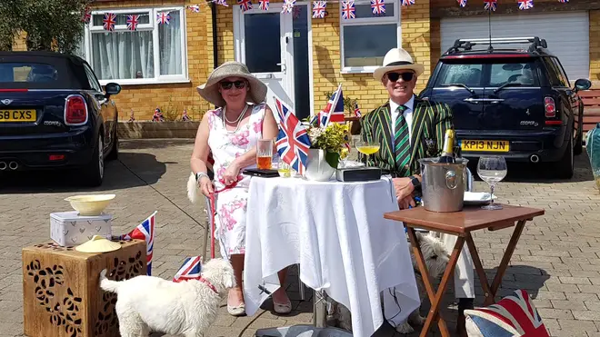 A couple in Northampton celebrate VE Day on their driveway