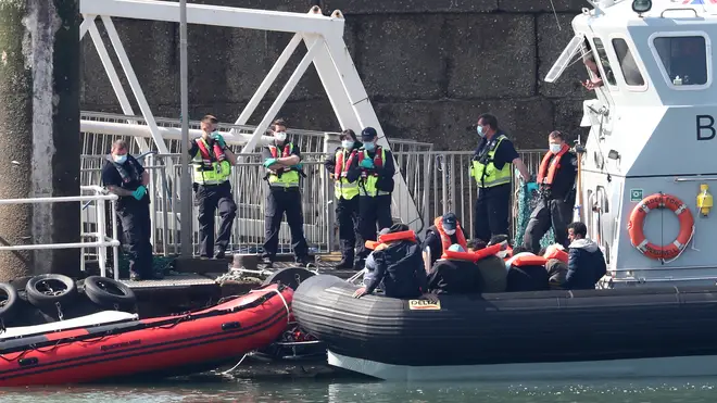 Border Force officers prepare to bring to shore men thought to be migrants in Dover, Kent, after small boat incidents in The Channel on Saturday