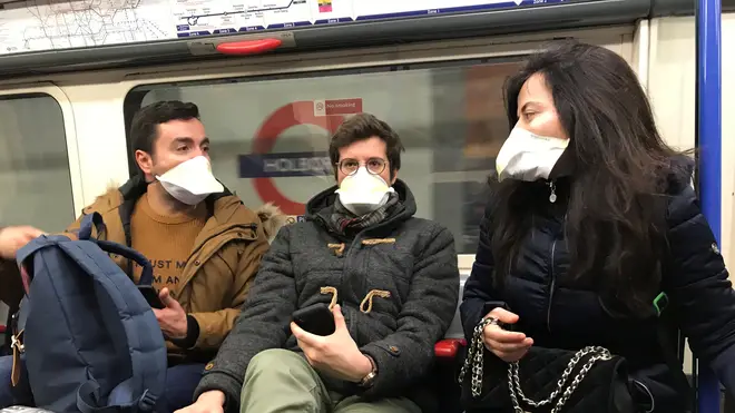 People have bene urged to wear face masks in shops and on public transport