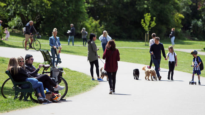 People can now meet each other in parks as long as social distancing rules are followed