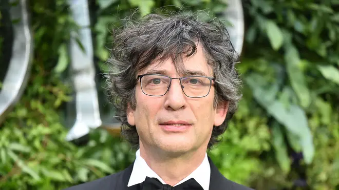 Neil Gaiman has defended his decision to fly back "home" to the Isle of Skye