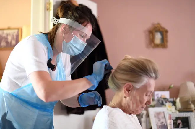 Care worker visiting a UK residents home