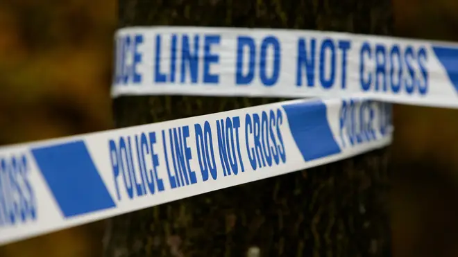 A man has died and two women arrested on suspicion of kidnap