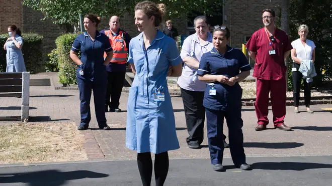 Staff lined the route of the funeral procession to pay tribute