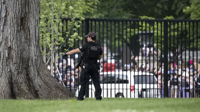 Crowds are seen from inside the White House perimeter on Friday