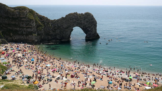The divers reportedly jumped off the 200ft arch cliff