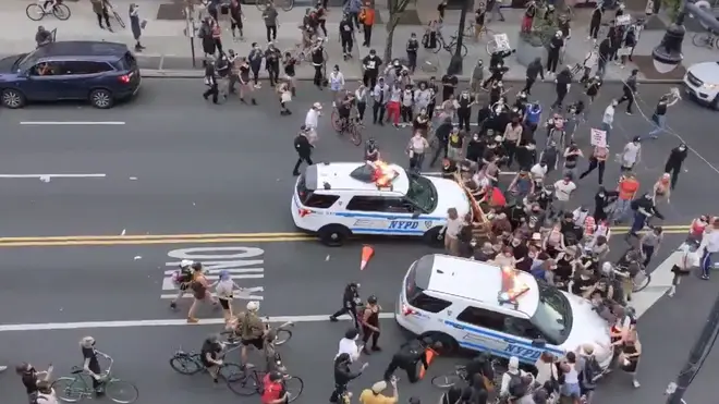 Two NYPD SUV's were filmed ramming into the crowd