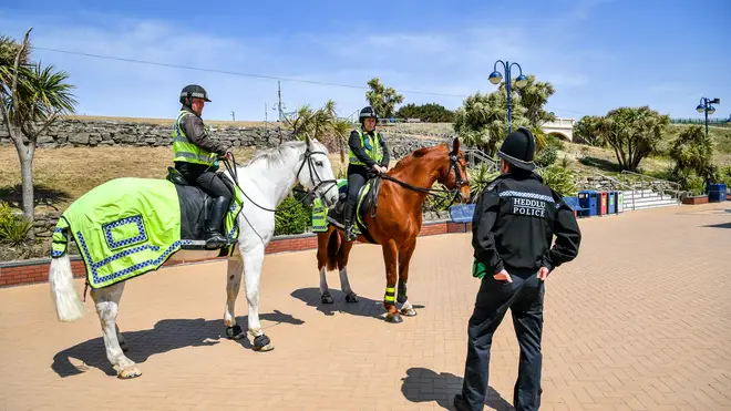 Mounted police patrol Barry Island amid the Covid-19 lockdown