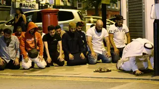 Muslims pray on the street after Finsbury Park collision