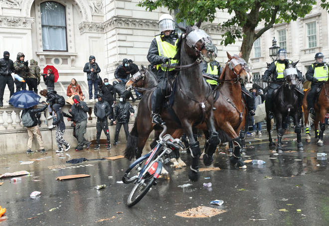 Mounted officers clashed with protesters on Whitehall