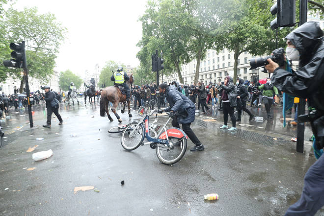 Police and some protesters clashed late on Saturday after anti-racism demonstrations