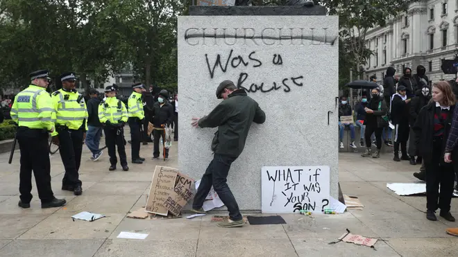 The statue of Winston Churchill was defaced in Parliament Square