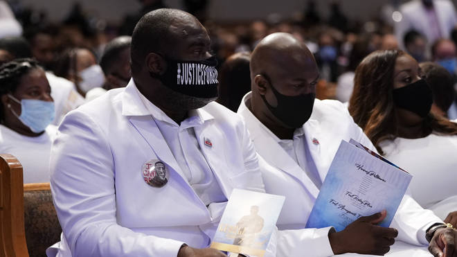 Philonise Floyd, right, and his brother Rodney Floyd attend the funeral service for their brother George Floyd