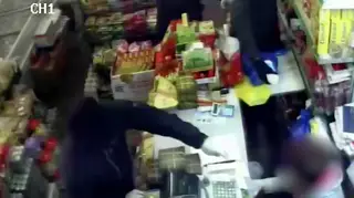 Shopkeeper sprayed in face with ammonia during brutal raid.