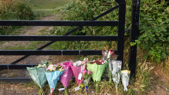 Tributes at the scene at an entrance to Fryent Country Park, in Wembley
