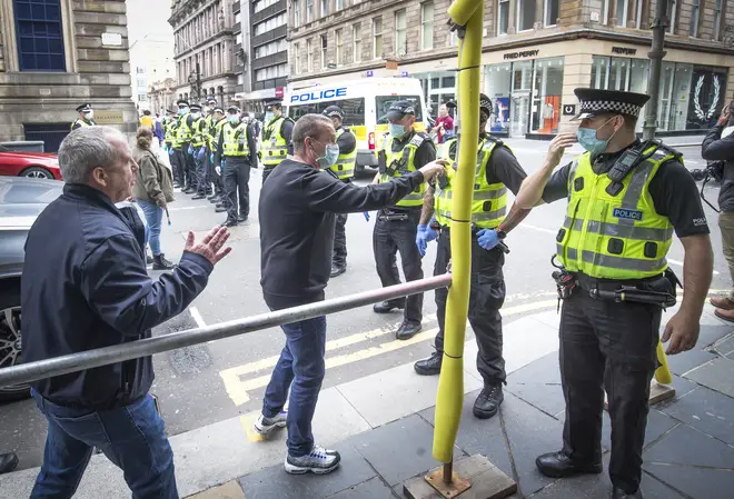 Some protesters clashed with police in Glasgow on Sunday