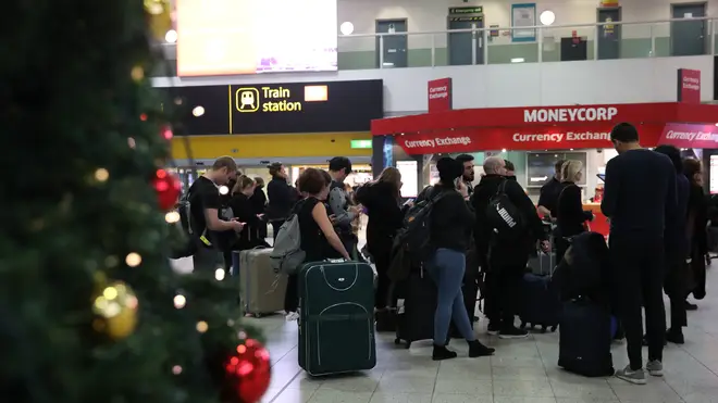 Passengers at Gatwick airport waiting for their flights following the chaos