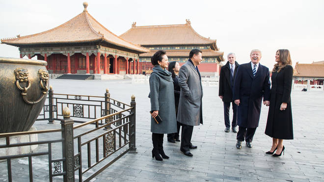 The world leaders are pictured during Trump's visit to Beijing in 2017