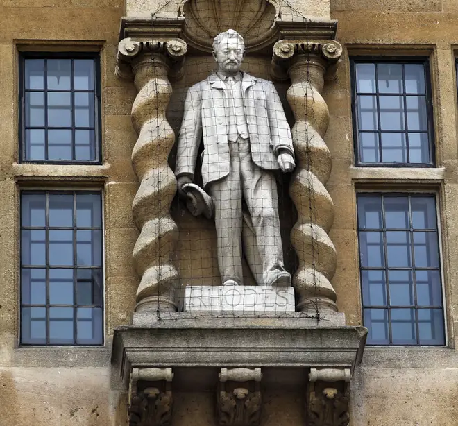 The Rhodes statues stands outside Oriel College, Oxford