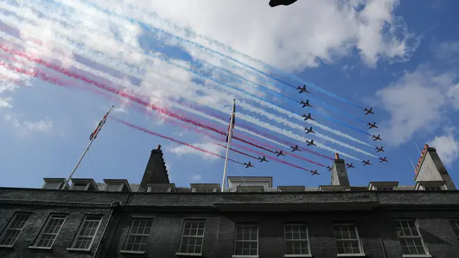 The Red Arrows fly over Downing Street as British Prime Minister Boris Johnson meets with French President Emmanuel Macron