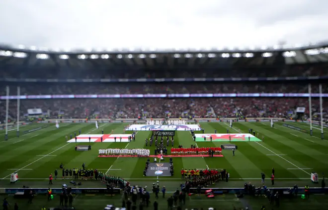 Both teams line-up for the national anthem before the Guinness Six Nations match at Twickenham