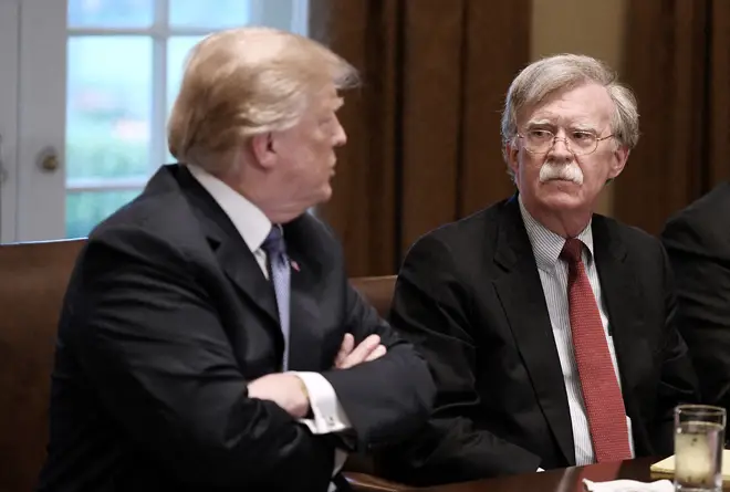 Donald Trump has tweeted that the author - his former aide John Bolton - must "pay a very big price" for revealing what he claims is "classified information"