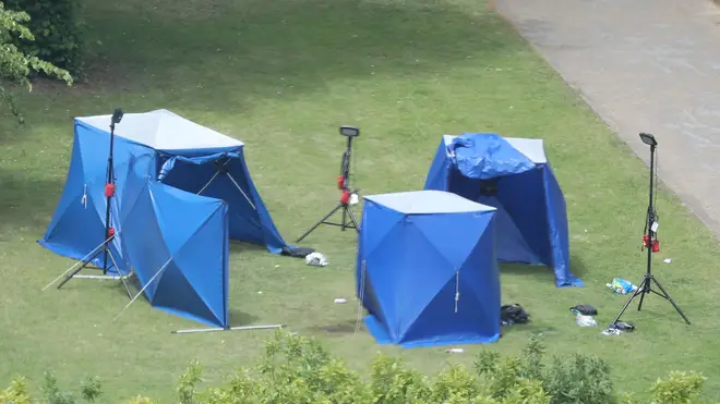 Police tents in Forbury Gardens in Reading town centre at the scene of a multiple stabbing attack