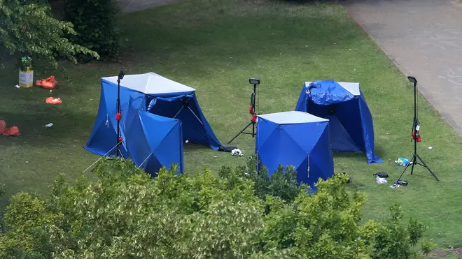 A picture shows police tents and equipment at the scene of the fatal stabbing incident