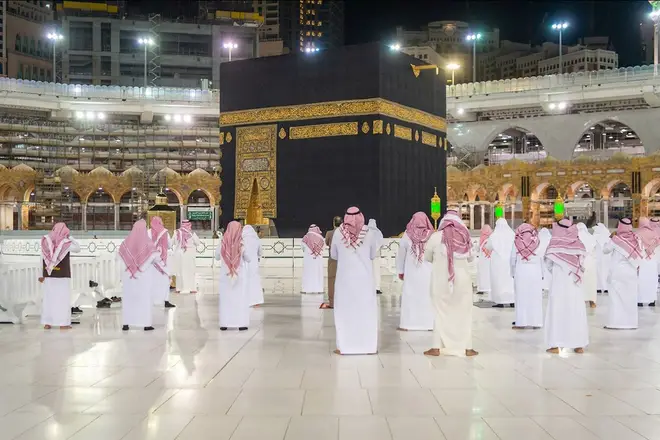 Social distancing during prayer for only few people around the Kaaba inside Mecca's Grand Mosque