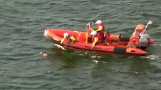 The moment the Cockerpoo was rescued by the coastguard