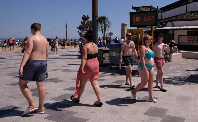 A message from Bournemouth Council tells people to go home if the beach is too busy