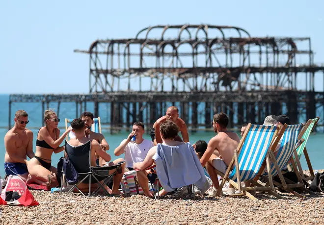 Some beach-goers in Brighton appeared to dismiss social distancing measures