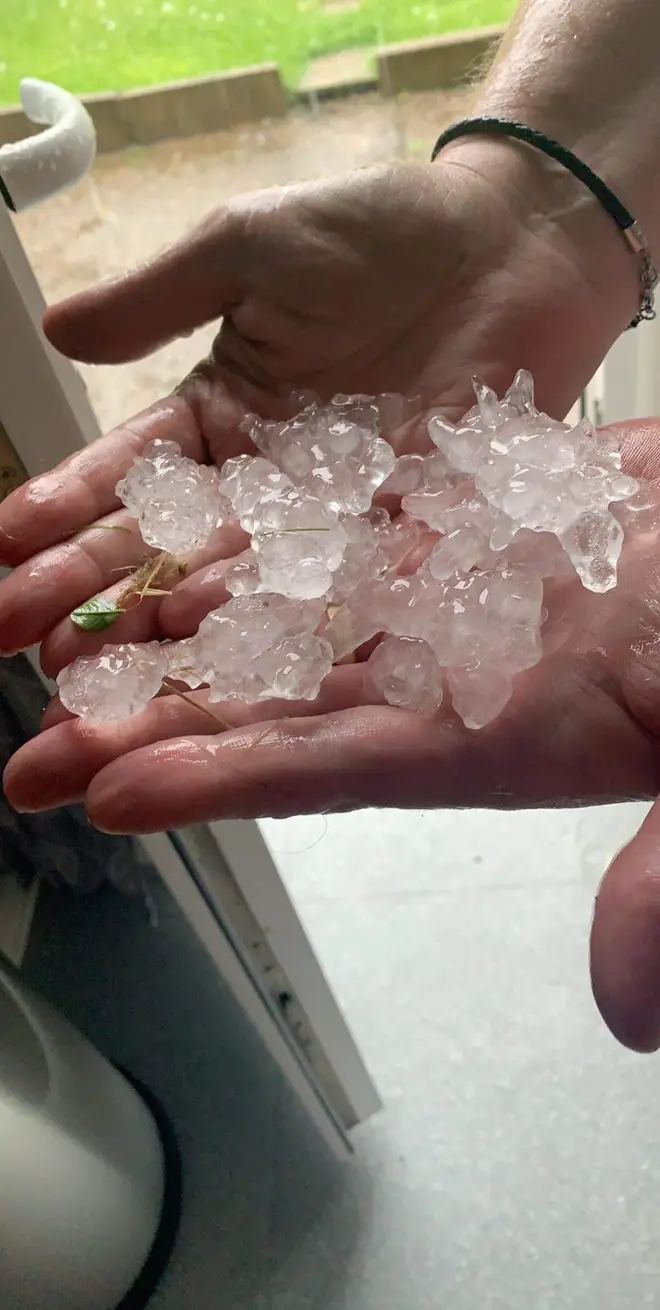 Heavy hail is set to be followed by thunderstorms and torrential rain