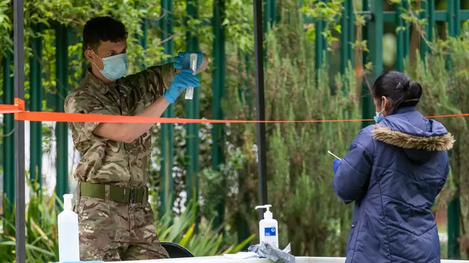 Members of the military operate a walk-in mobile Covid-19 testing centre at Spinney Hill Park in Leicester