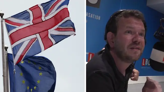 James O'Brien next to some flags