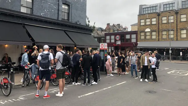 Scenes in Battersea saw dozens of people congregating in the street and enjoying a "takeaway pint"