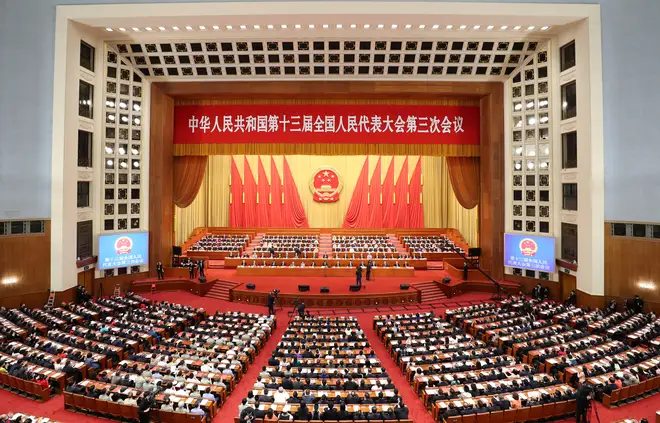 Chinese officials in the Great Hall Of The People in Beijing