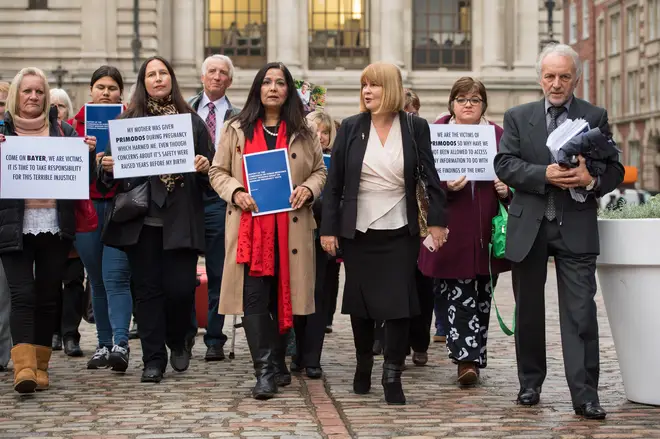 File photo: Yasmin Qureshi MP (fifth from left) and Chair of the Association for Children Damaged by Hormone Pregnancy Tests Marie Lyon (third from right)