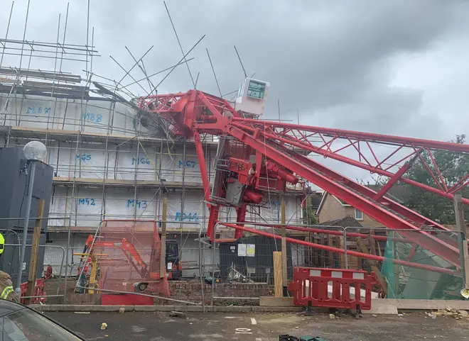 Pictures show how the crane tore through the buildings