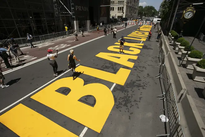 Black lives matter activists painted the slogan outside Trump Tower