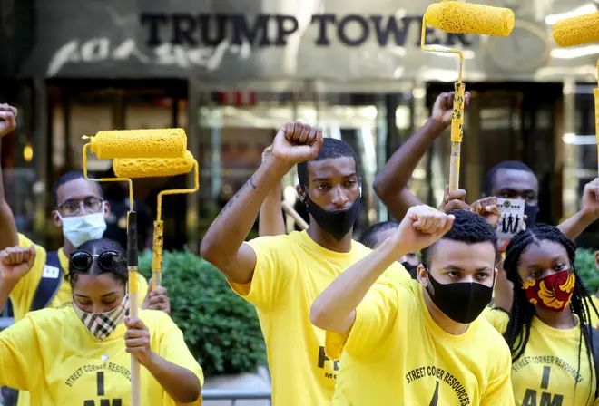 Activists stood outside Trump Tower in Manhattan