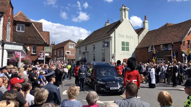 Dame Vera Lynn's funeral cortege passes through the village of Ditchling