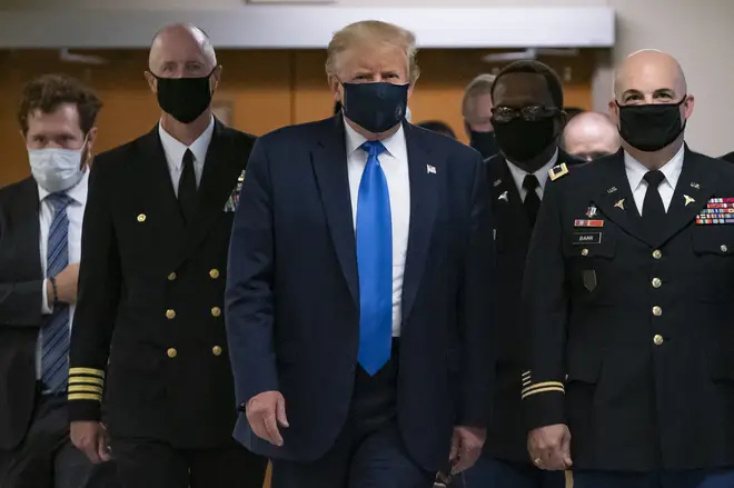 Trump wore the mask on a visit to a military hospital