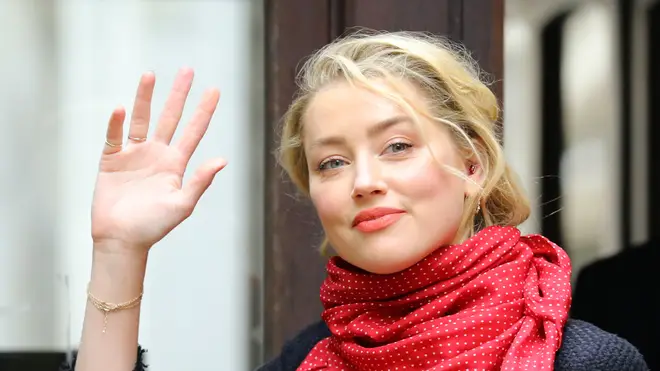 Actress Amber Heard arrives at the High Court in London for a hearing in Johnny Depp's libel case