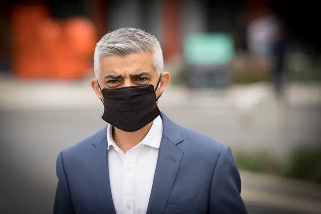 Mayor of London Sadiq Khan watching young people take part in socially-distanced sports, during a visit to Mossbourne Riverside Academy in Hackney