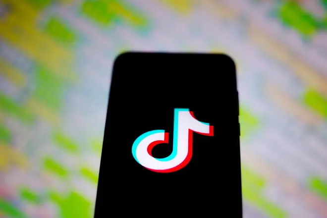 File photo: The TikTok logo displayed on a smartphone